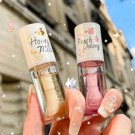 AMS Peach Bee Kiss : L’Huile à Lèvres Lait de Pêche & Miel qui Hydrate, Répare et Sublime” 🍑🐝💋 - AMS Officiel