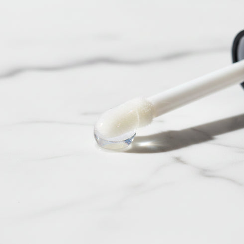 AMS Cosmetics – Clear Gloss Droplet Light Refraction